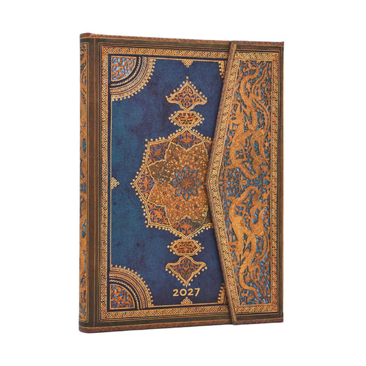A 2027 daily planner with an ornate Persian-style cover featuring a deep blue background and intricate gold patterns, shown on a plain white background.